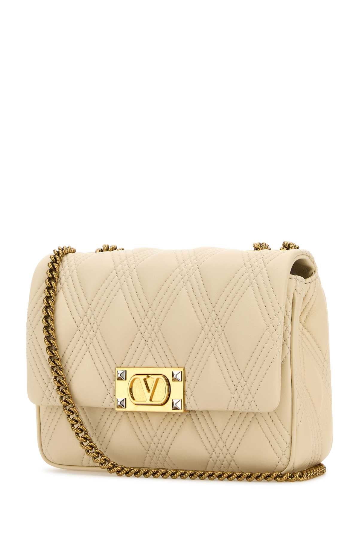 VALENTINO GARAVANI MEDIUM SHOULDER BAG | QUI For Women Exterior: 100% Nappa leather Lining: 100% Nappa leather Finishing: Antiqued golden brass