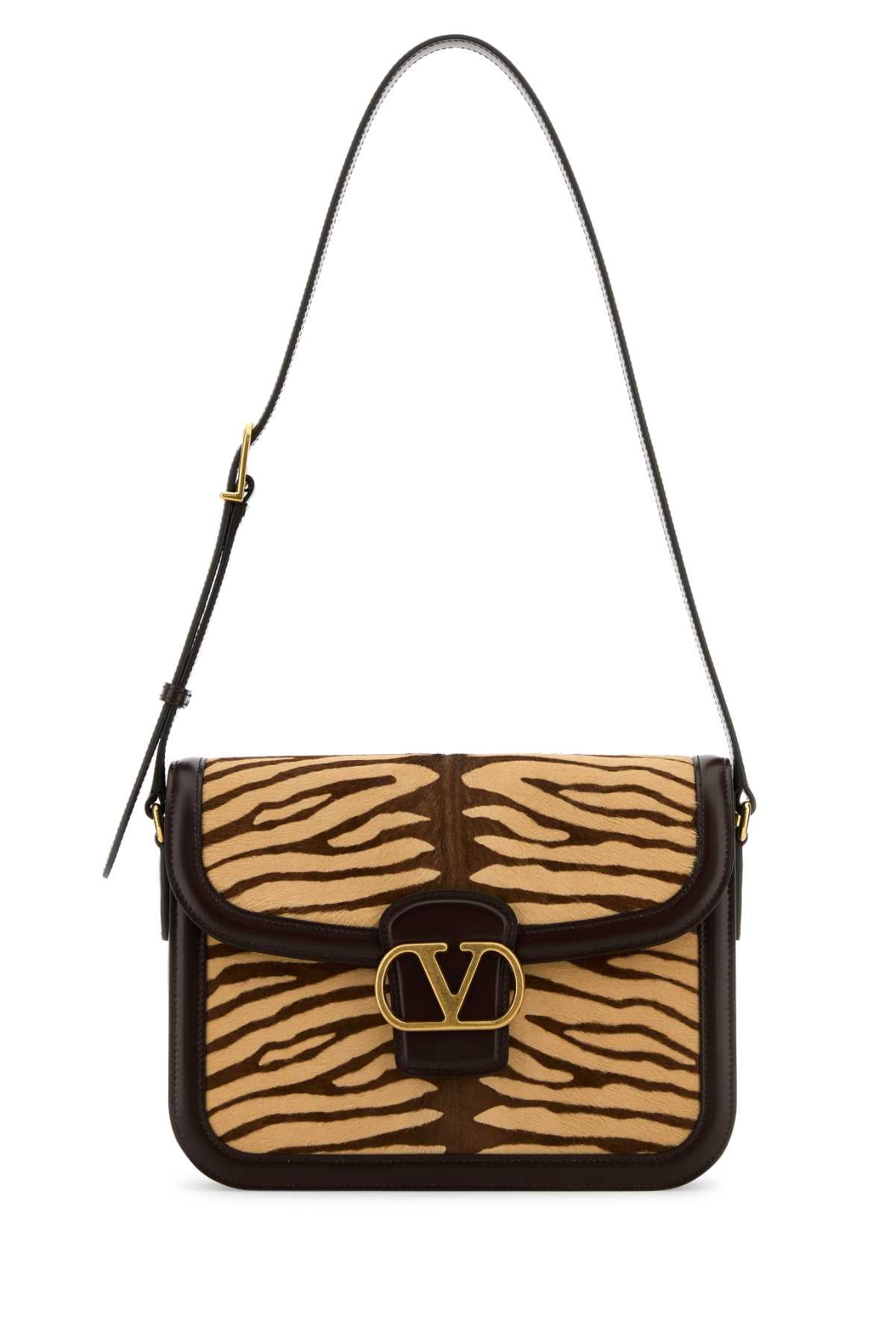 VALENTINO GARAVANI SHOULDER BAG | 9TO5 | CAL For Women Exterior: 100% Calf hair 100% Leather Lining: 100% Nappa leather Finishing: Golden metal