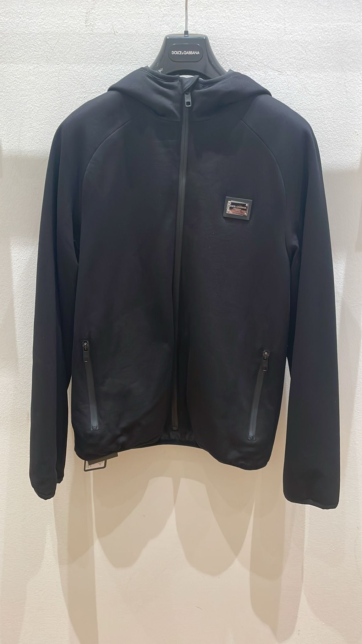 Jersey hooded jacket with metal logo plate
