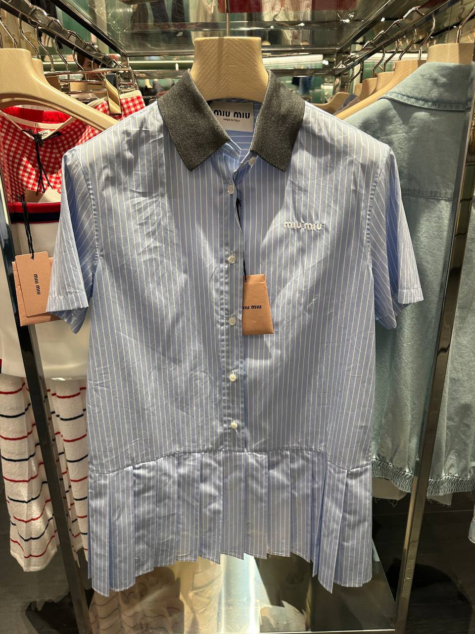 Poplin shirt with pleated hem