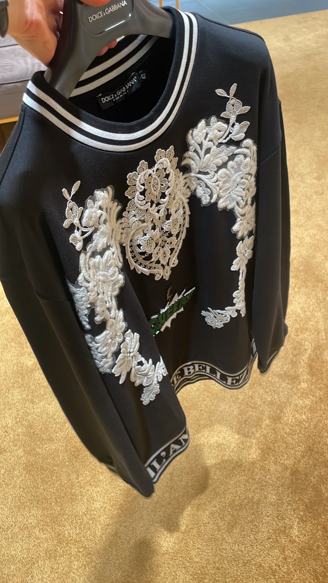 Jersey sweatshirt with floral embroidery and logo