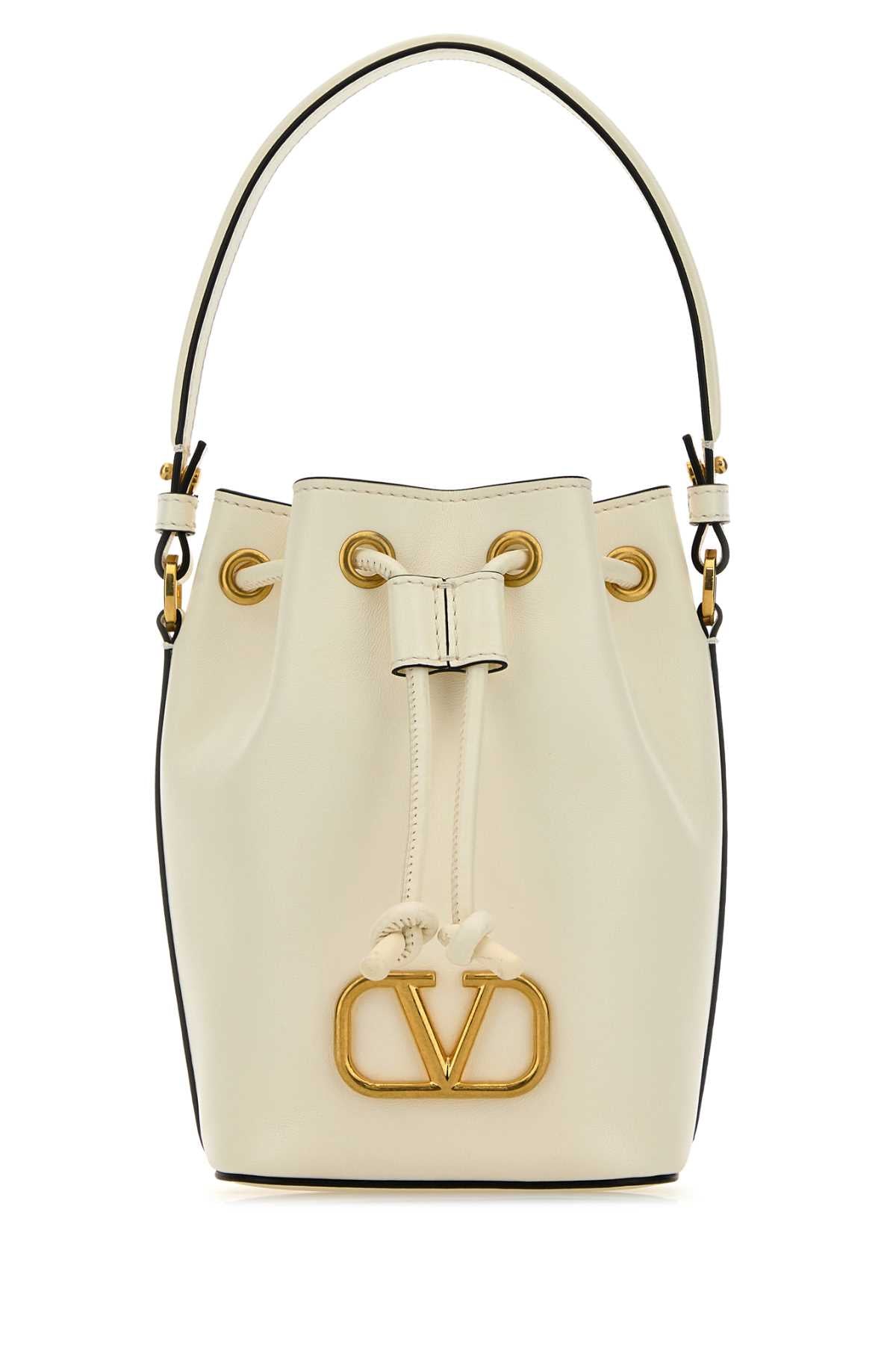 VALENTINO GARAVANI MINI DRAWSTRING | VLOGO S For Women Exterior: 100% Nappa leather Lining: 100% Nappa leather Finishing: Antiqued golden metal