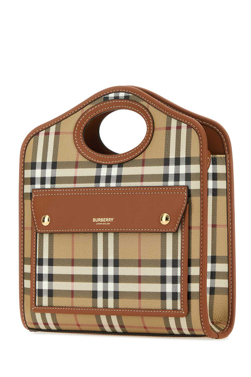 BURBERRY BORSA For Women Exterior: 69% Polyurethane 17% Polyester 14% Cotton Lining: 100% Cotton Finishing: Golden metal