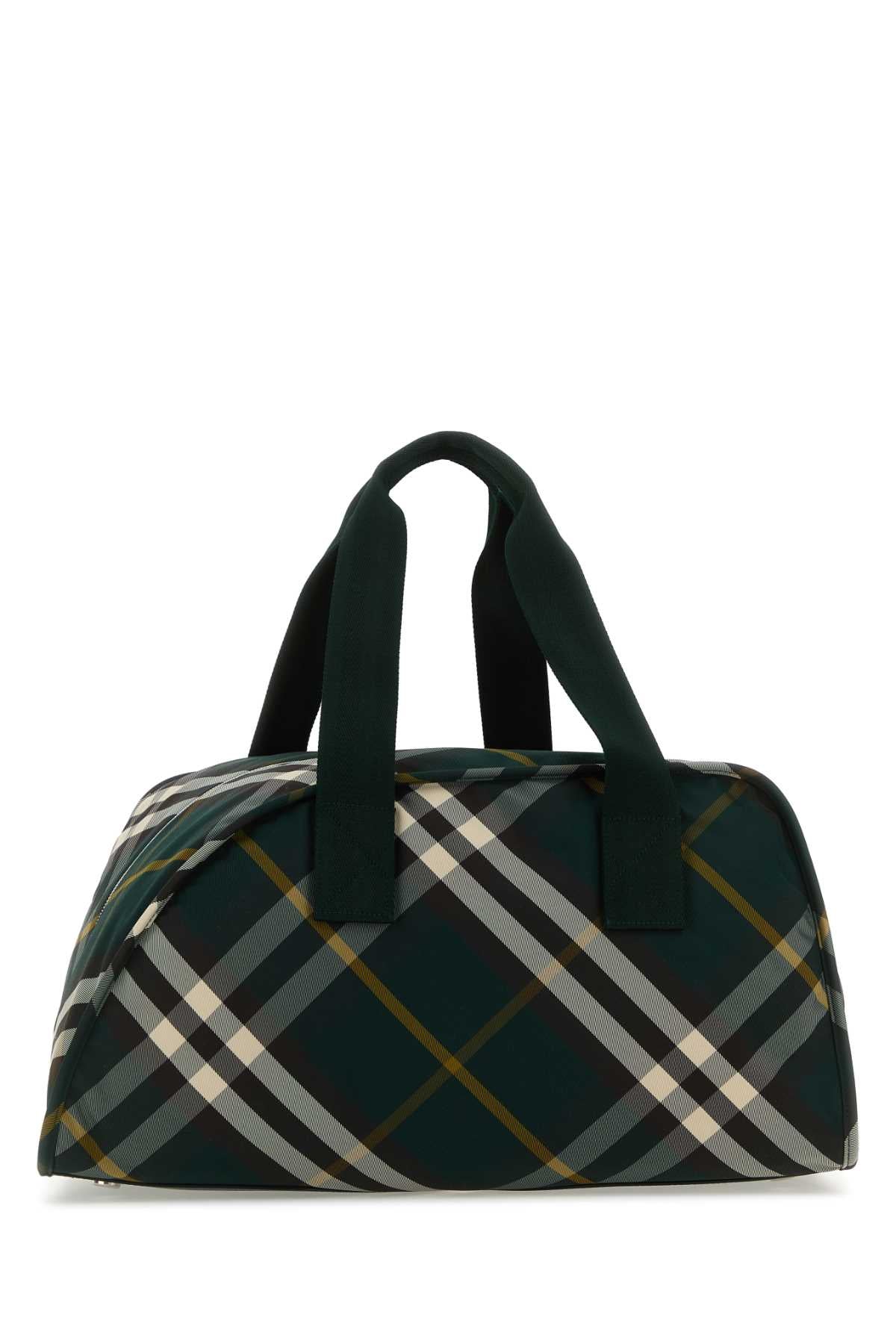 BURBERRY BORSA For Men Exterior: 100% Nylon Lining: 100% Nylon Finishing: Silver metal