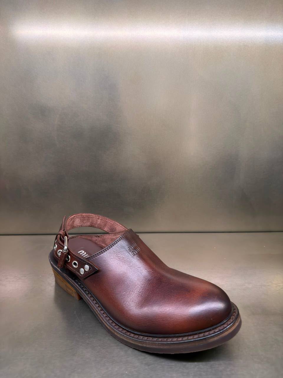 Leather slingback clogs