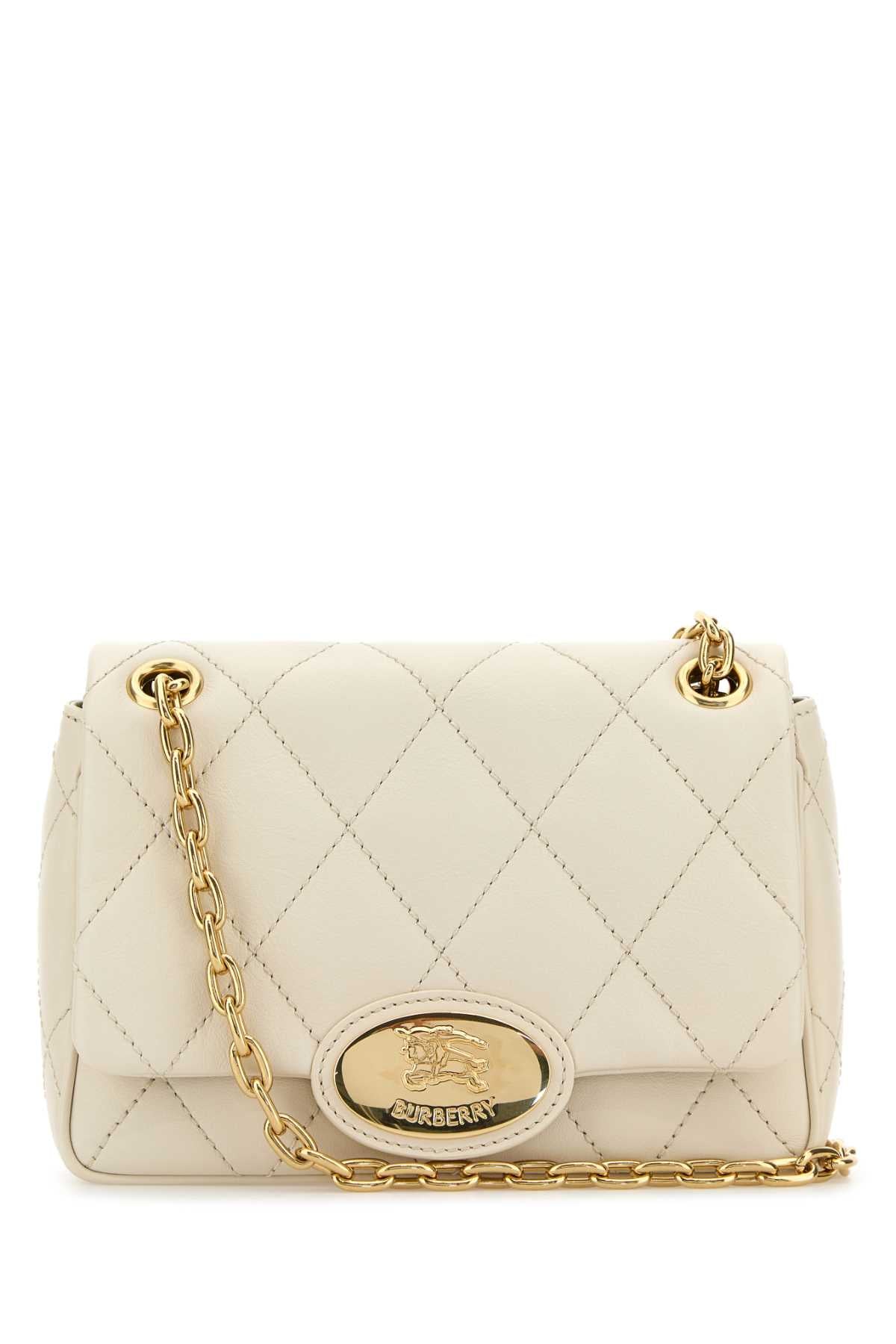 BURBERRY LL SM STRAND QUL For Women Exterior: 100% Calf Lining: 100% Cotton Finishing: Golden metal
