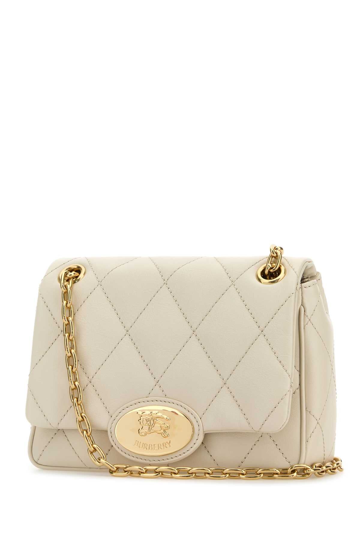 BURBERRY LL SM STRAND QUL For Women Exterior: 100% Calf Lining: 100% Cotton Finishing: Golden metal