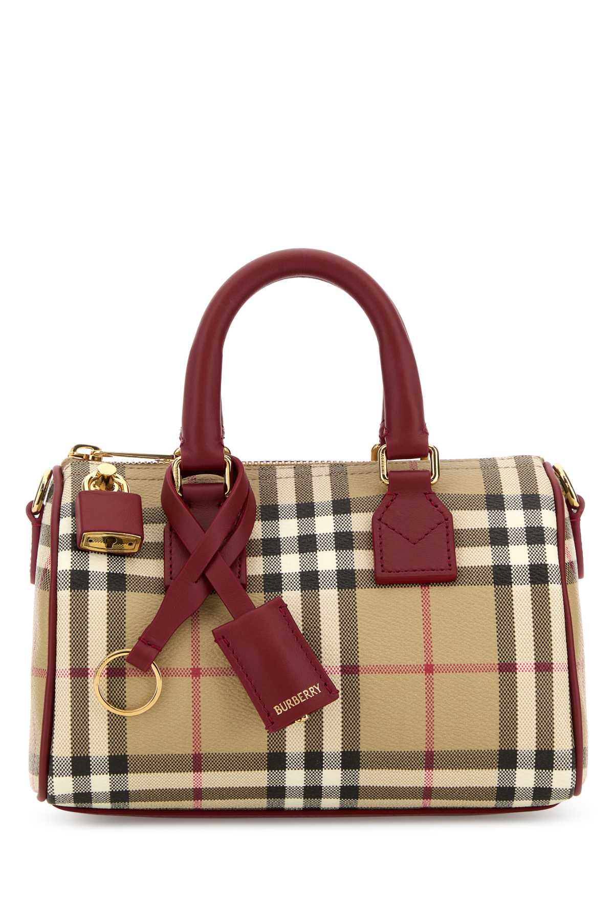 BURBERRY LL MN BOWLING DFC For Women Exterior: 48% Cotton 38% Polyurethane 14% Polyester Lining: 100% Cotton Finishing: Golden metal