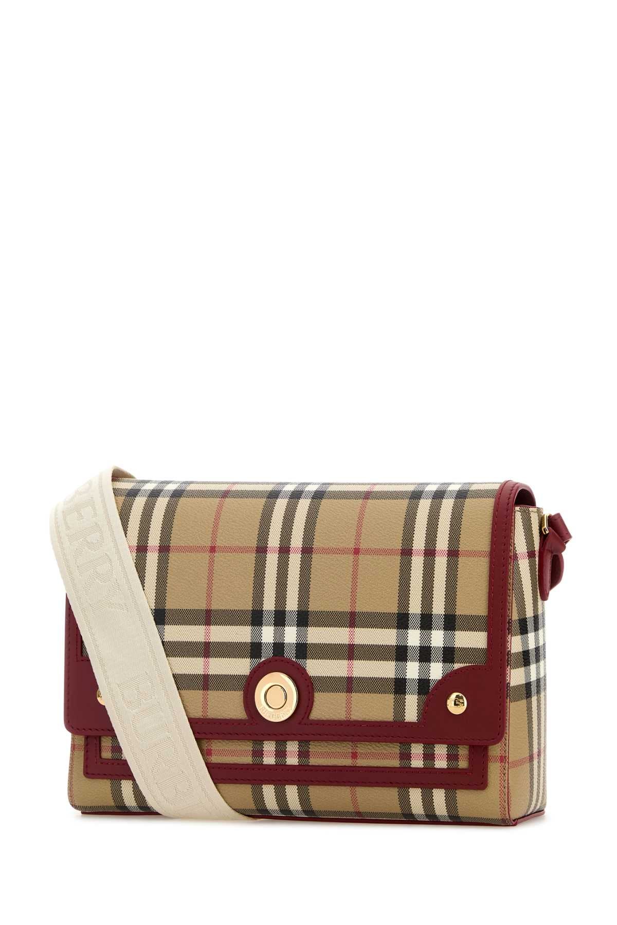 BURBERRY LL MD NOTE DFC For Women Exterior: 55% Polyurethane 25% Polyester 20% Cotton Lining: 100% Cotton Finishing: Golden metal