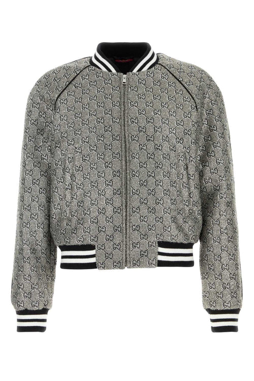 GUCCI BOMBER For Men Exterior: 46% Viscose 21% Metallized fiber 20% Nylon 7% Polyester 6% Cotton Lining: 100% Viscose