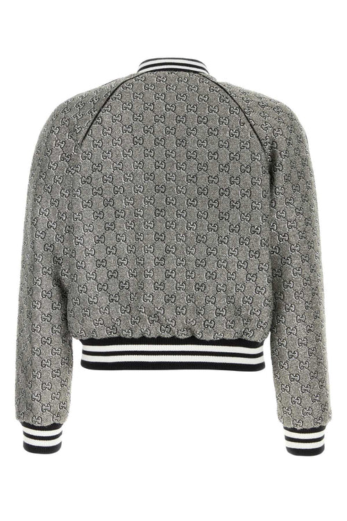 GUCCI BOMBER For Men Exterior: 46% Viscose 21% Metallized fiber 20% Nylon 7% Polyester 6% Cotton Lining: 100% Viscose