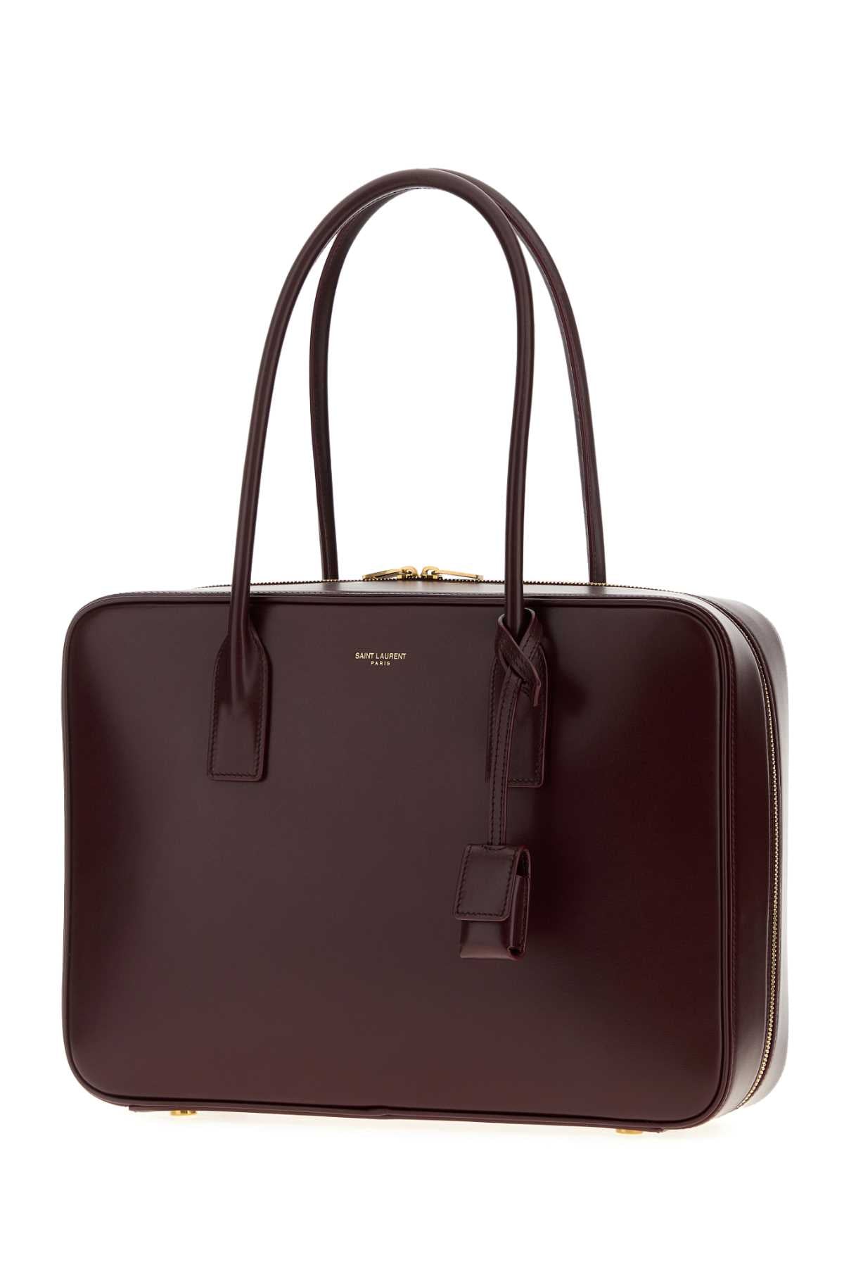 SAINT LAURENT YSL BO SDJ BAULETTO For Women Exterior: 100% Lamb Lining: 100% Suede Finishing: Golden metal