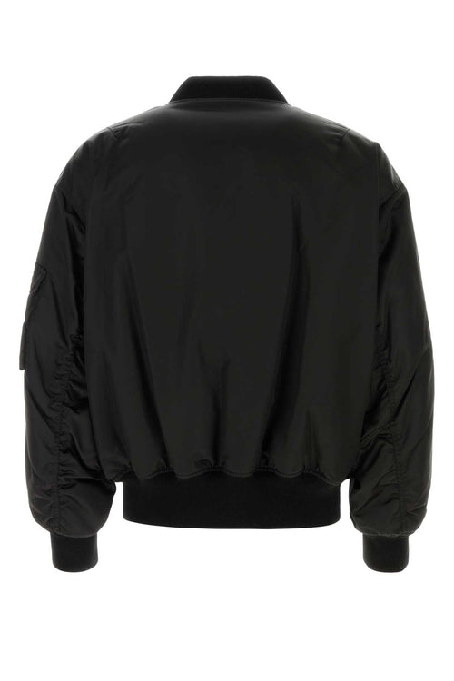 SAINT LAURENT BOMBER BOULE OVERSIZ For Men Exterior: 100% Nylon Lining: 64% Viscose 34% Cotton