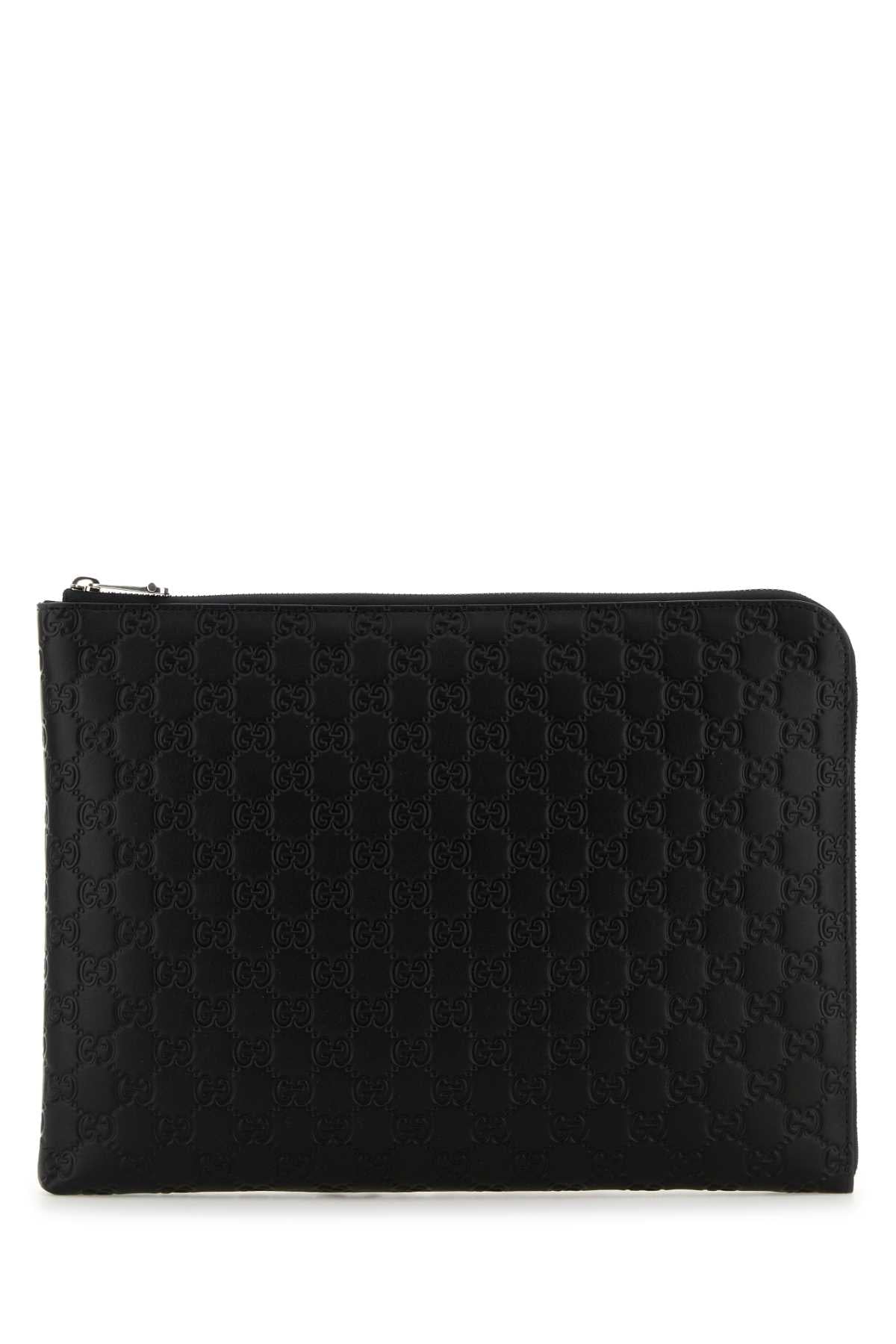 GUCCI MAN POUCH WITH REMOVABLE HANDLE For Men Exterior: 100% Leather Lining: 100% Fabric Finishing: Silver metal