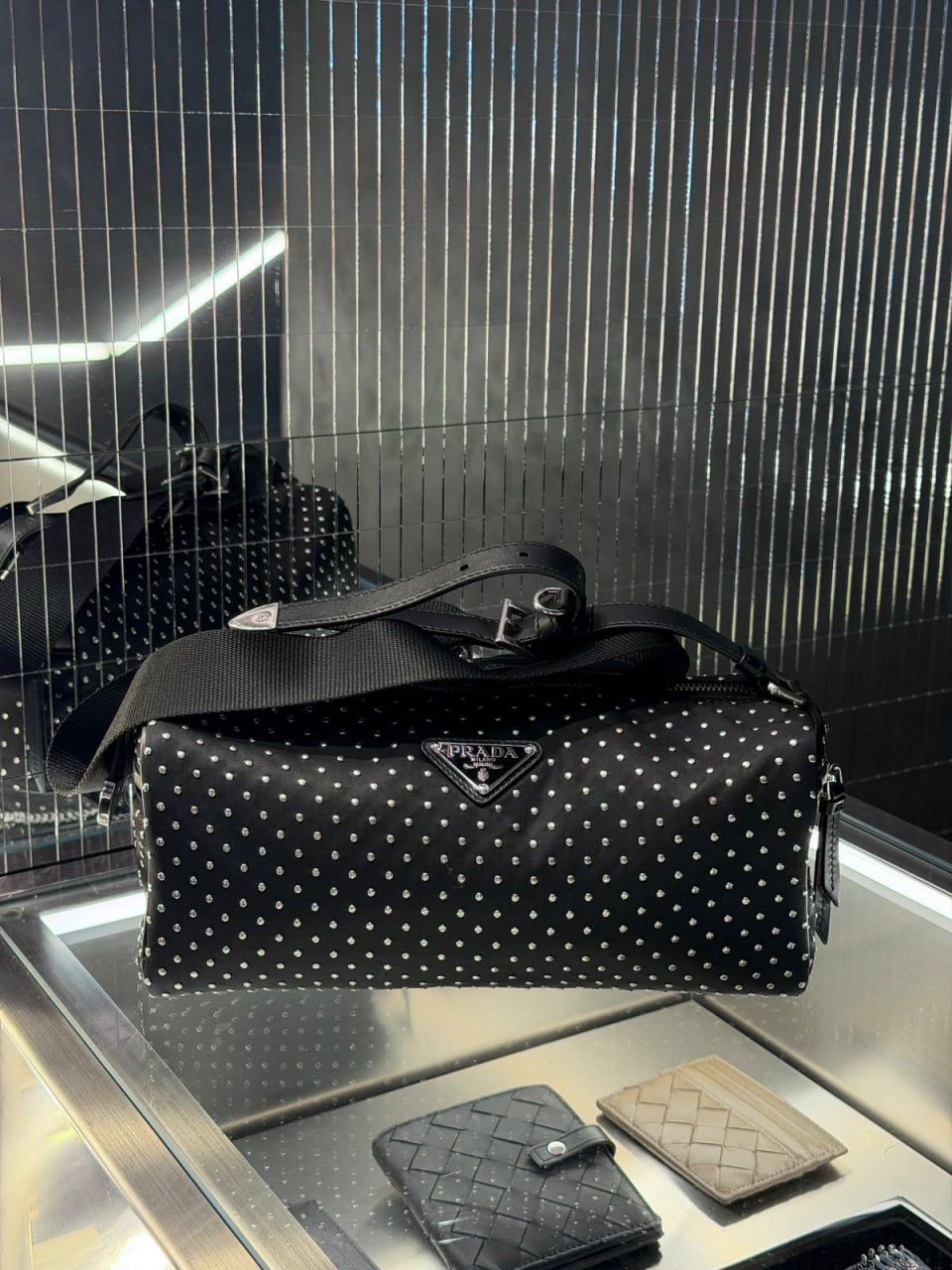 Re-Nylon and leather bag with studs