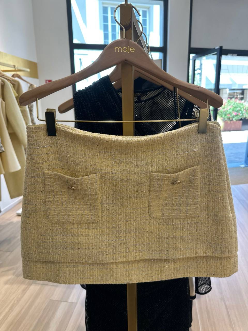 Tweed mini skirt with pockets