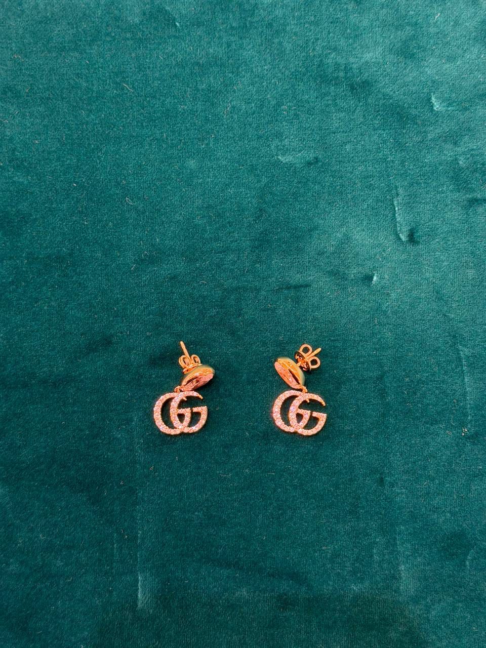 Double G earrings with crystals
