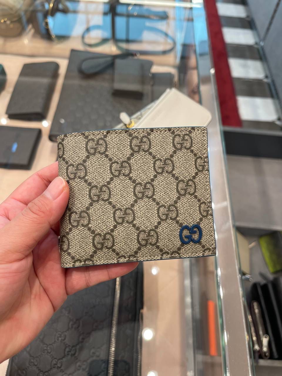 GG Supreme wallet with blue interlocking G