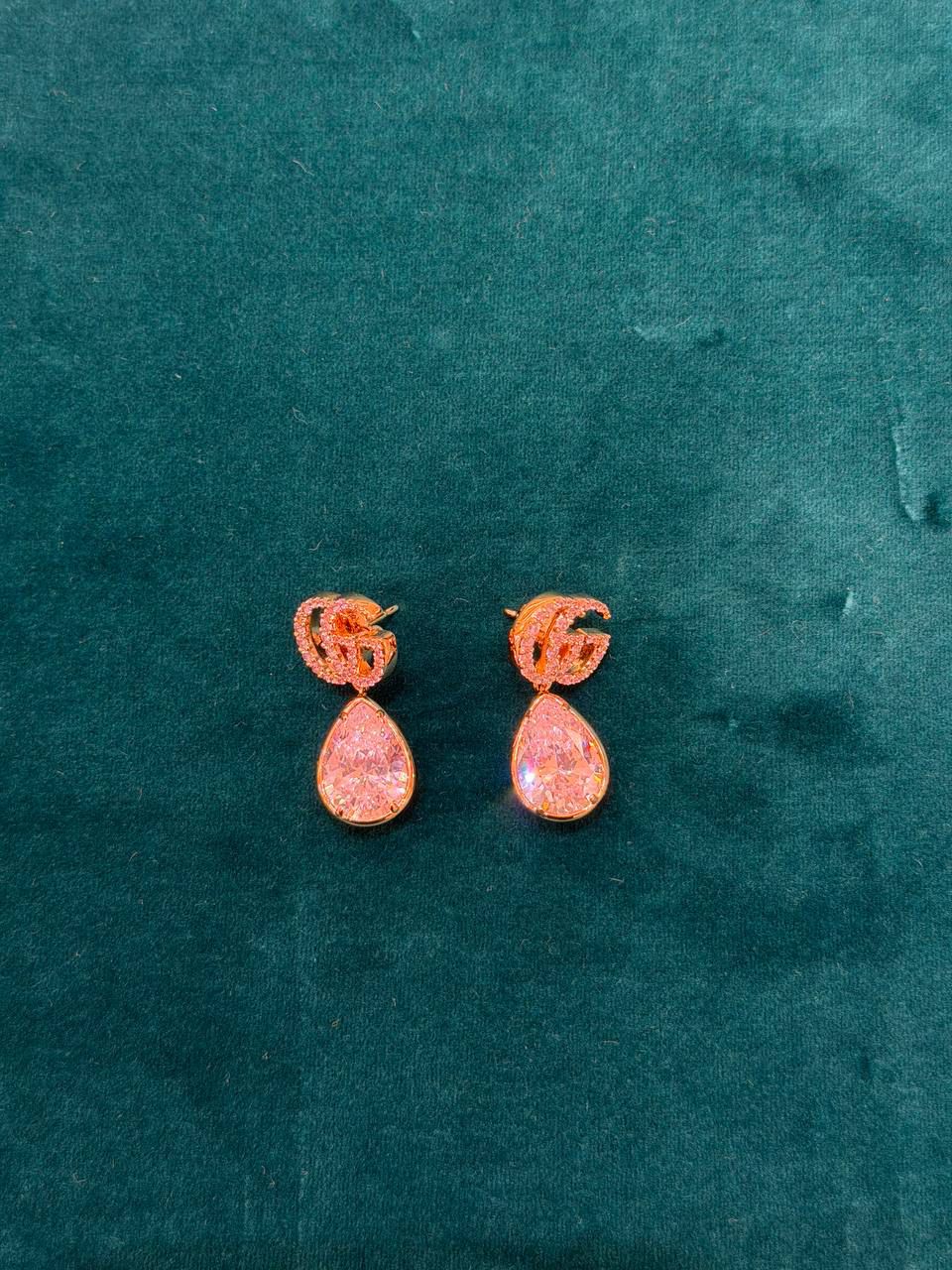 Double G earrings with crystals