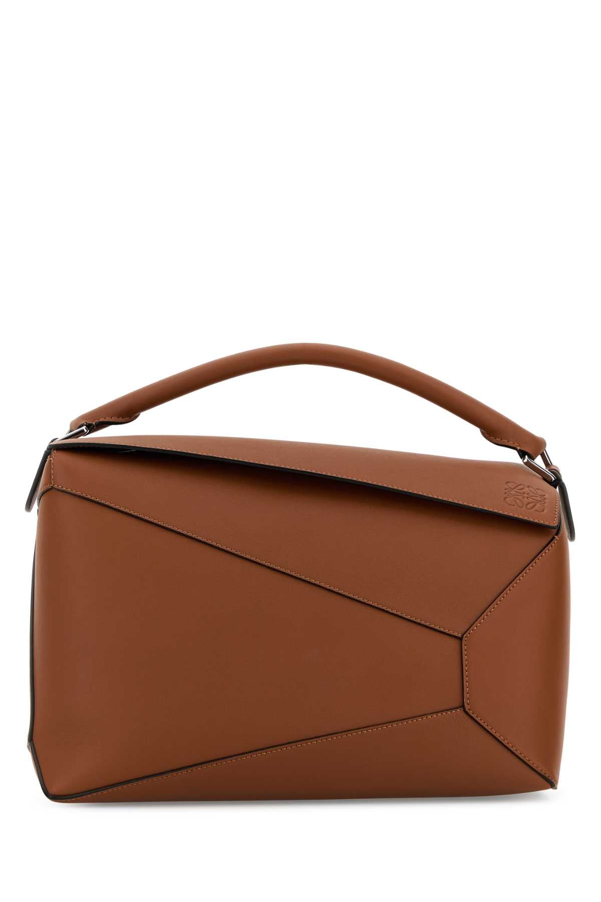 LOEWE PUZZLE EDGE NEW LARGE For Men Exterior: 100% Calf Lining: 100% Fabric Finishing: Silver metal