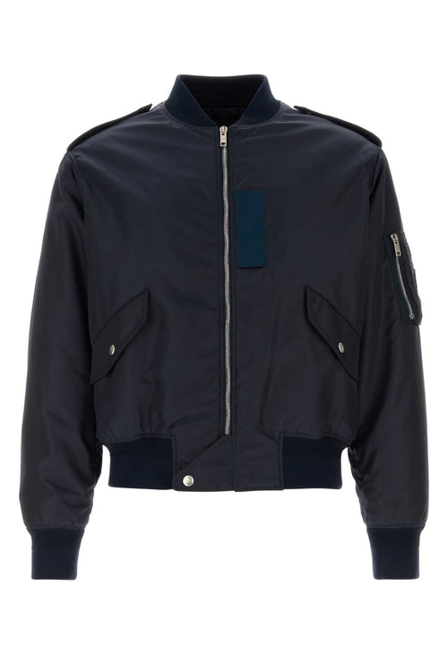 GIVENCHY BOMBER For Men Exterior: 100% Nylon Lining: 100% Viscose Padding: 100% Polyester