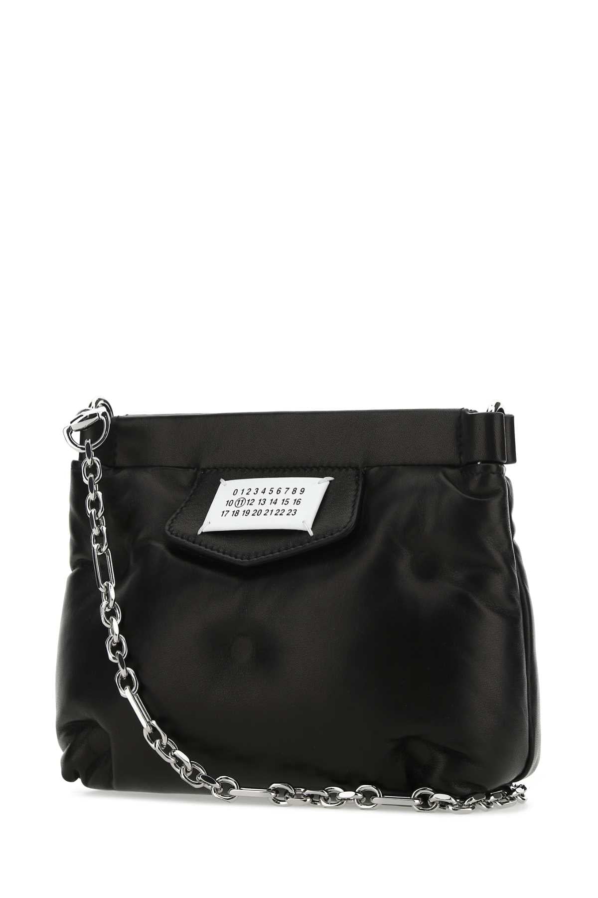 MAISON MARGIELA BORSA For Women Corpo: 100% Pelle Ovina - Applicazione: 100% Pelle Bovina - Fodera: 100% Poliestere - Interno: 100% Pelle Ovina - Minuteria Metallica: 60% Ottone 40% Zinc Alloy - Minuteria Metallica 1: 100% Zinc Alloy - Minuteria Metallica 2: 100% Ottone