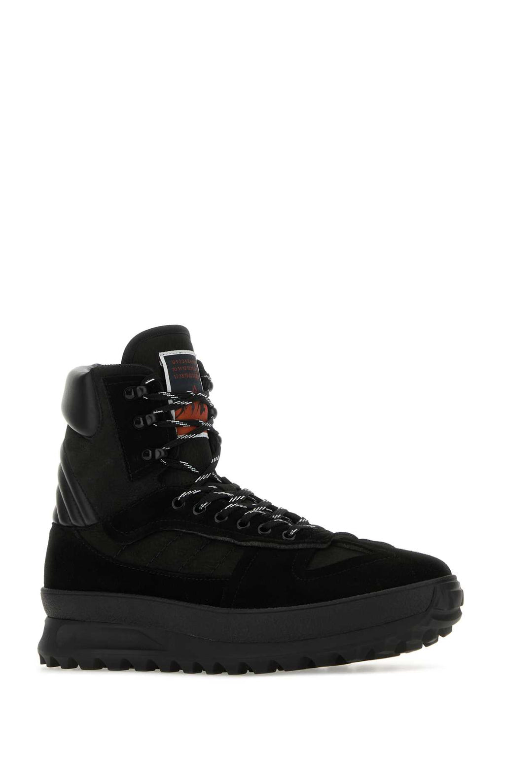 MAISON MARGIELA SNEAKERS For Men Exterior: 100% Calf 100% Suede Interior: 100% Polyester Sole: Rubber
