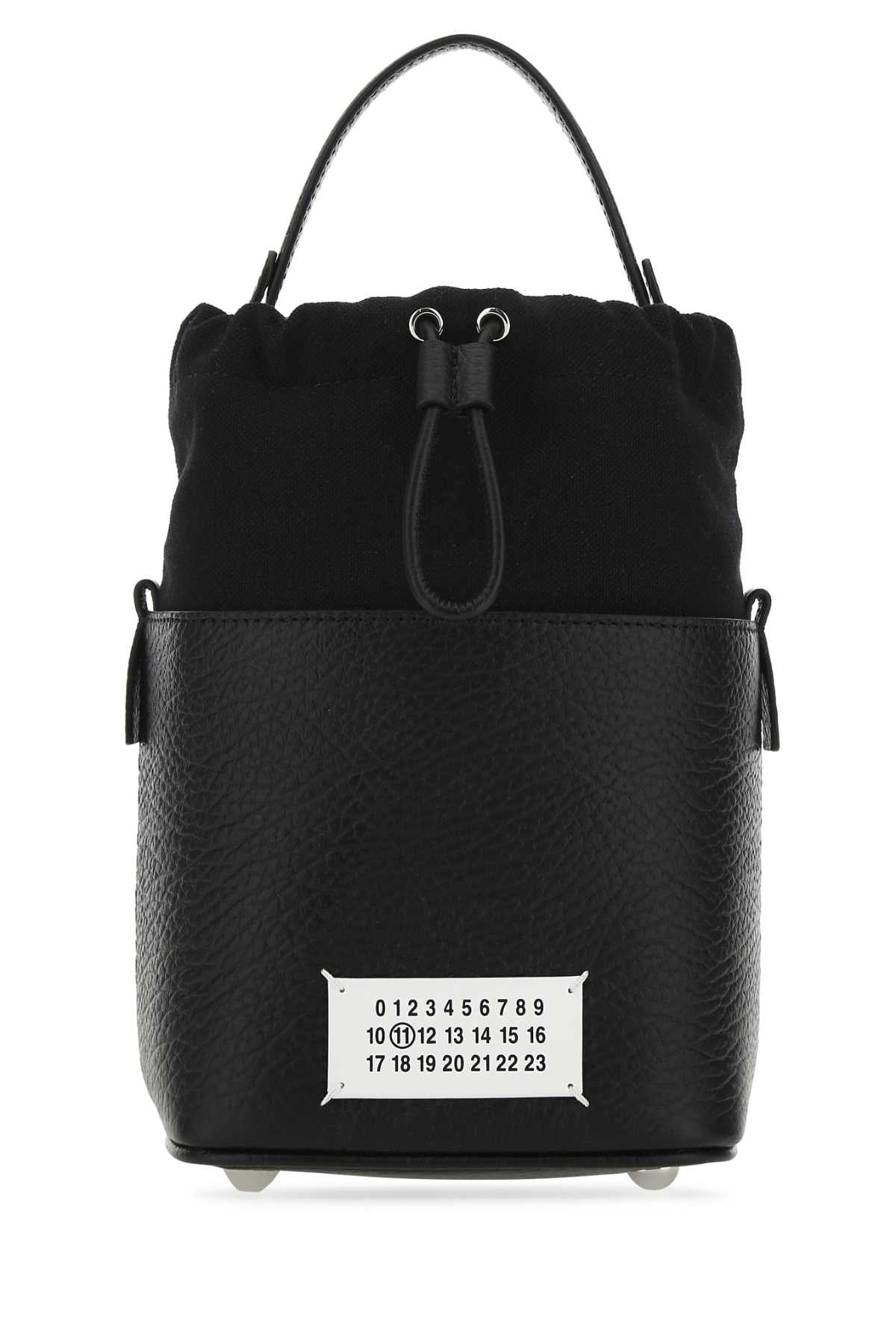 MAISON MARGIELA BORSA For Women Corpo: 100% Pelle Bovina - Contrasto: 79% Cotone 16% Poliestere 5% Altre Fibre - Fodera: 100% Cotone - Interno: 100% Pelle Bovina - Minuteria Metallica: 60% Ottone 40% Zinc Alloy - Minuteria Metallica 1: 100% Zama - Minuteria Metallica 2: 100% Ottone