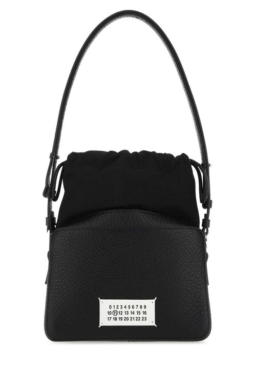 MAISON MARGIELA BORSA For Women Exterior: 100% Bovine leather 79% Cotton 15% Polyester 6% Other fibers Lining: 100% Cotton Finishing: Silver metal