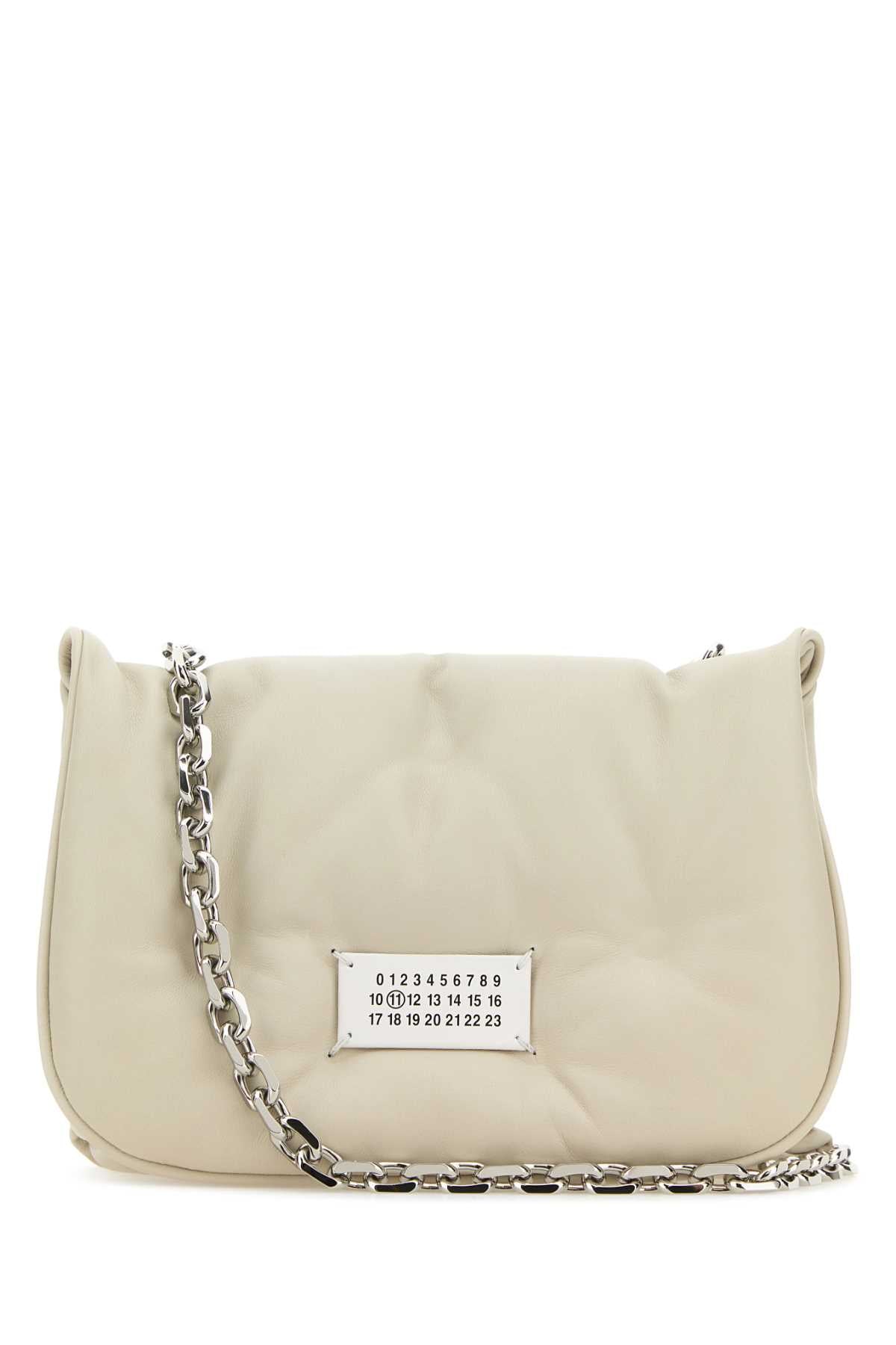 MAISON MARGIELA BORSA For Women Corpo: 100% Pelle Ovina - Applicazione: 100% Pelle Bovina - Fodera: 100% Poliestere - Interno: 100% Pelle Ovina - Minuteria Metallica: 100% Ottone - Minuteria Metallica 1: 94% Zinc Alloy 4% Alluminio 2% Rame