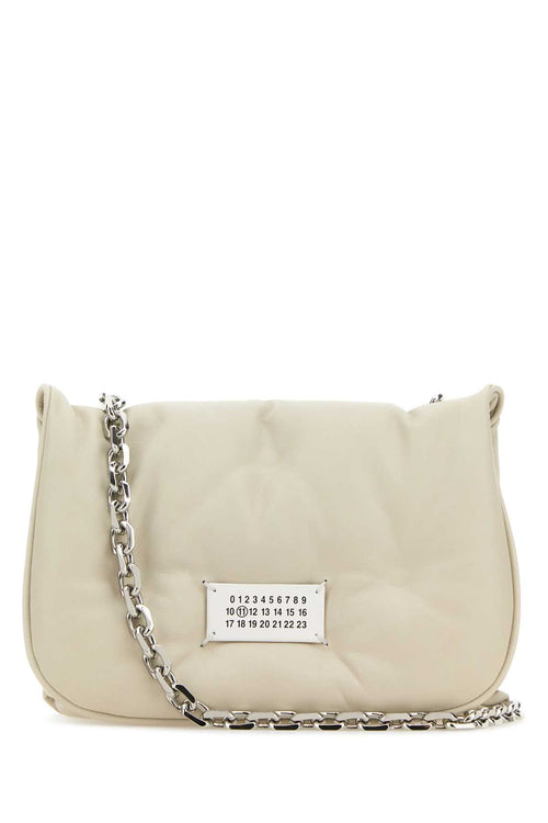 MAISON MARGIELA BORSA For Women Corpo: 100% Pelle Ovina - Applicazione: 100% Pelle Bovina - Fodera: 100% Poliestere - Interno: 100% Pelle Ovina - Minuteria Metallica: 100% Ottone - Minuteria Metallica 1: 94% Zinc Alloy 4% Alluminio 2% Rame