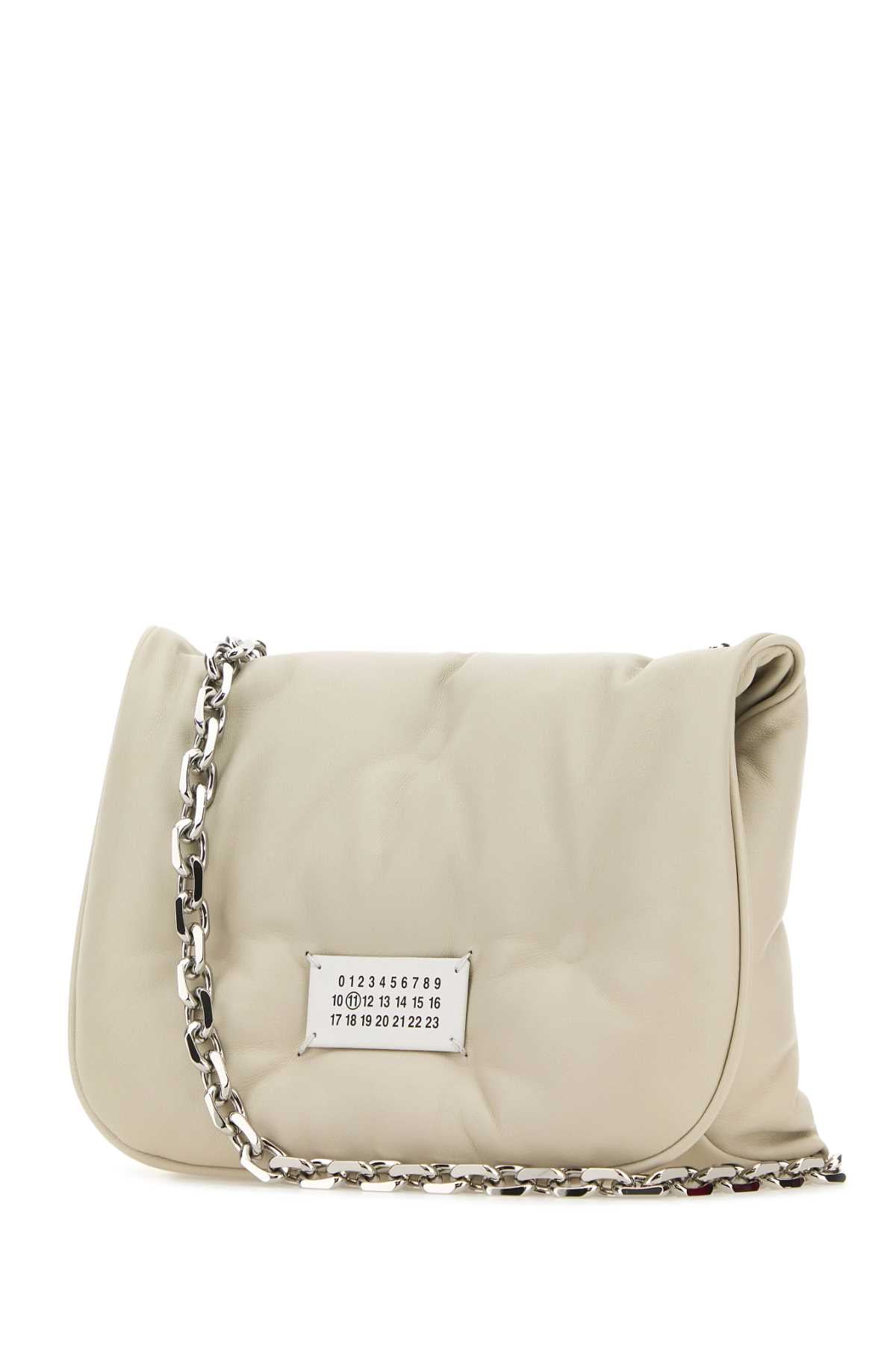 MAISON MARGIELA BORSA For Women Corpo: 100% Pelle Ovina - Applicazione: 100% Pelle Bovina - Fodera: 100% Poliestere - Interno: 100% Pelle Ovina - Minuteria Metallica: 100% Ottone - Minuteria Metallica 1: 94% Zinc Alloy 4% Alluminio 2% Rame
