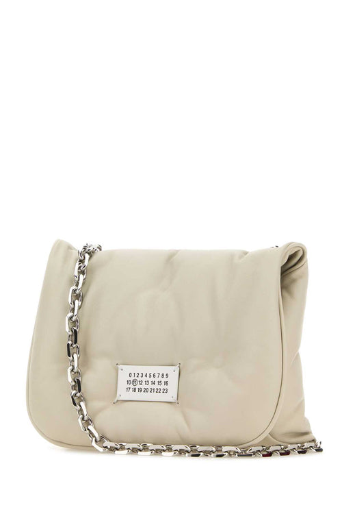 MAISON MARGIELA BORSA For Women Corpo: 100% Pelle Ovina - Applicazione: 100% Pelle Bovina - Fodera: 100% Poliestere - Interno: 100% Pelle Ovina - Minuteria Metallica: 100% Ottone - Minuteria Metallica 1: 94% Zinc Alloy 4% Alluminio 2% Rame