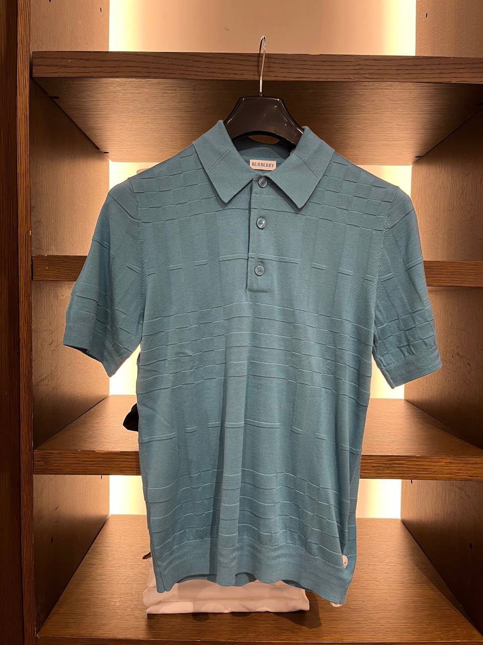 Check-pattern knitted polo shirt