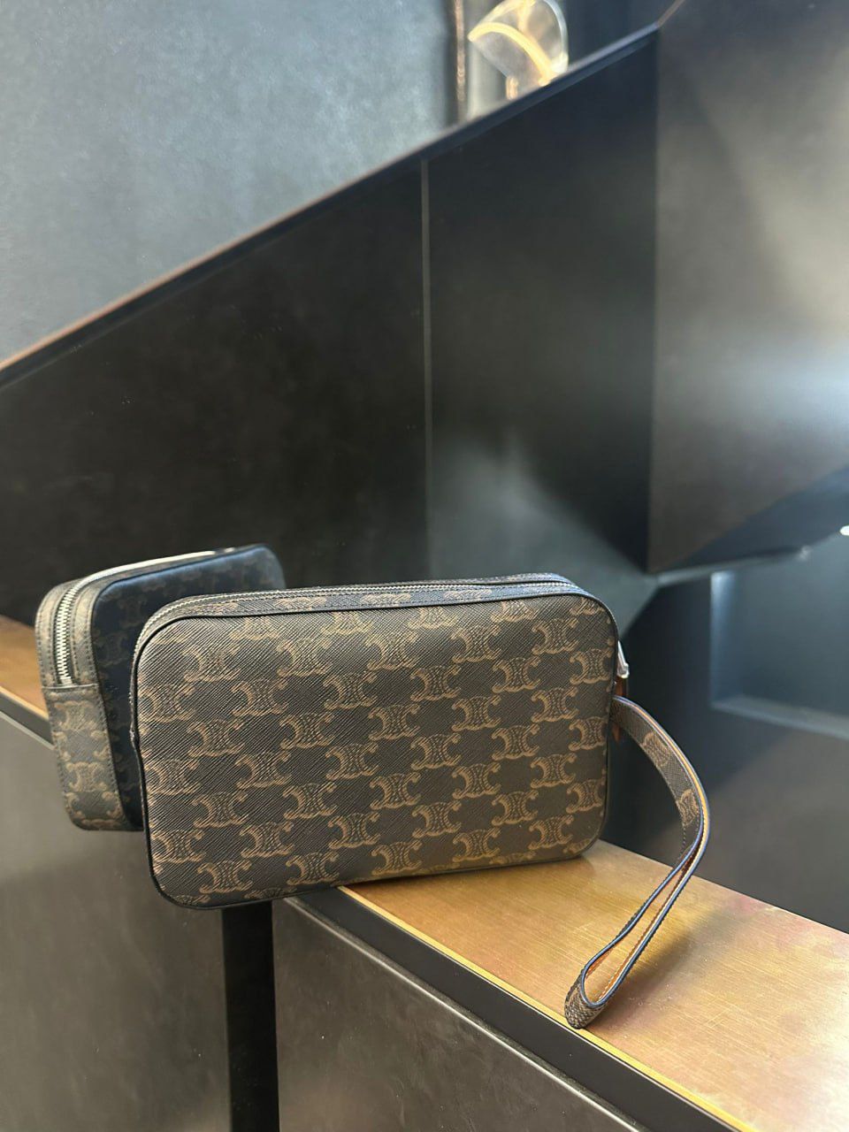 Clutch with Wrist Strap in Triomphe Canvas