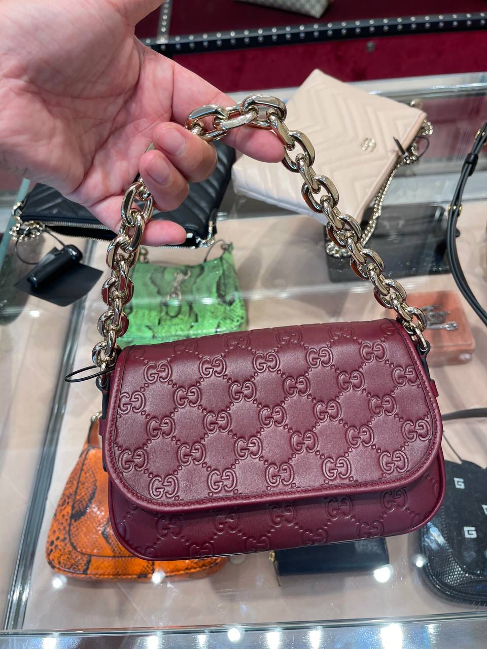 GG Embossed Mini Shoulder Bag