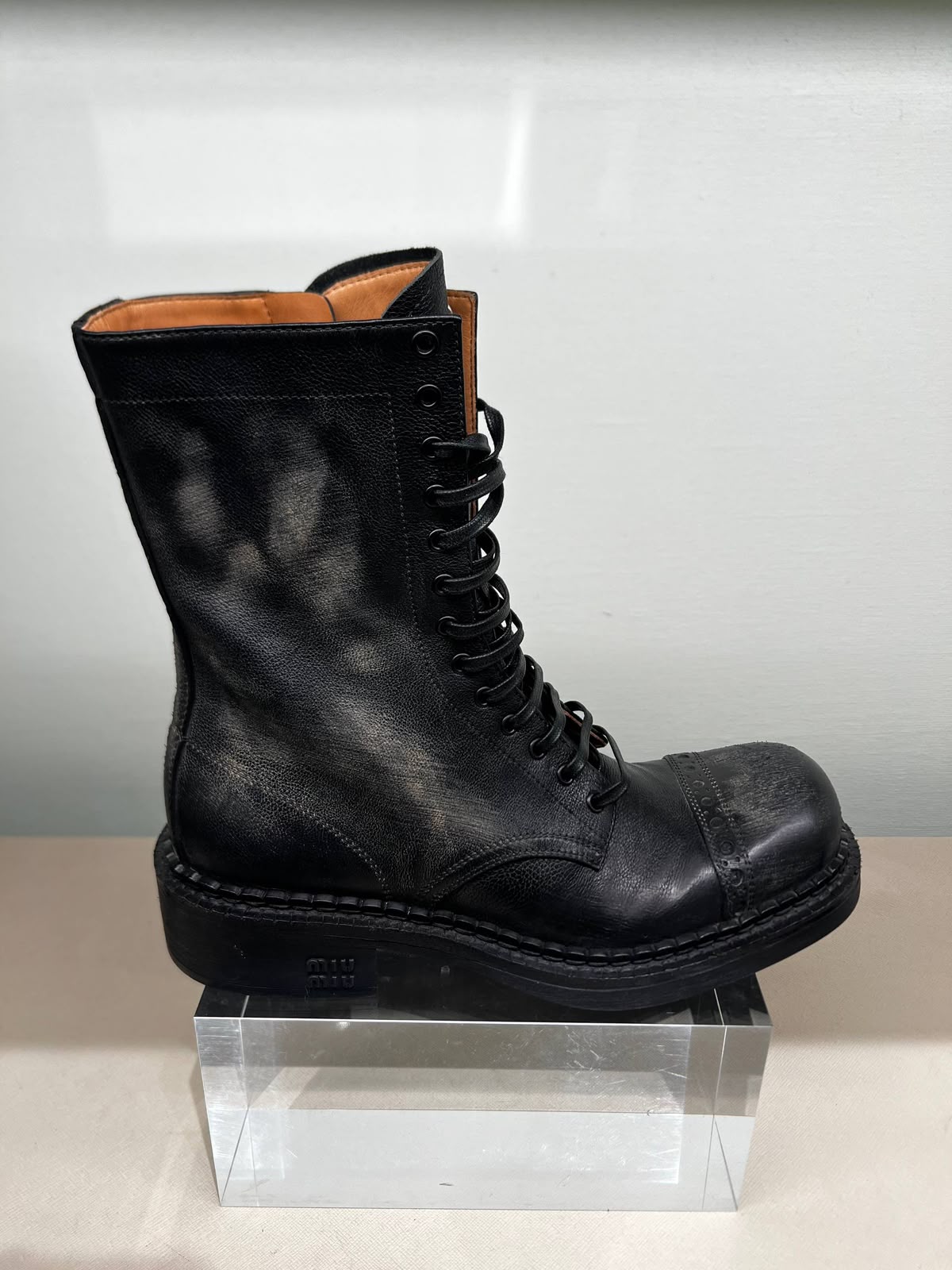 Brushed leather lace-up boots