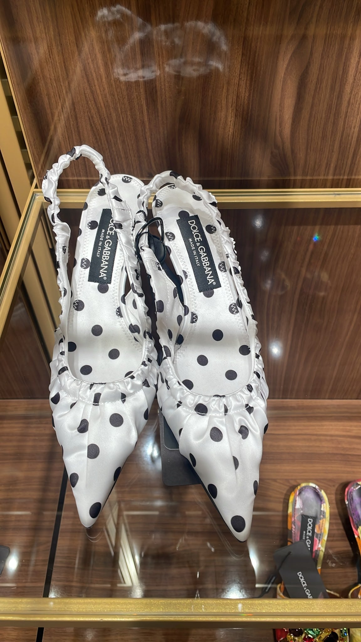 Polka-dot satin slingback pumps