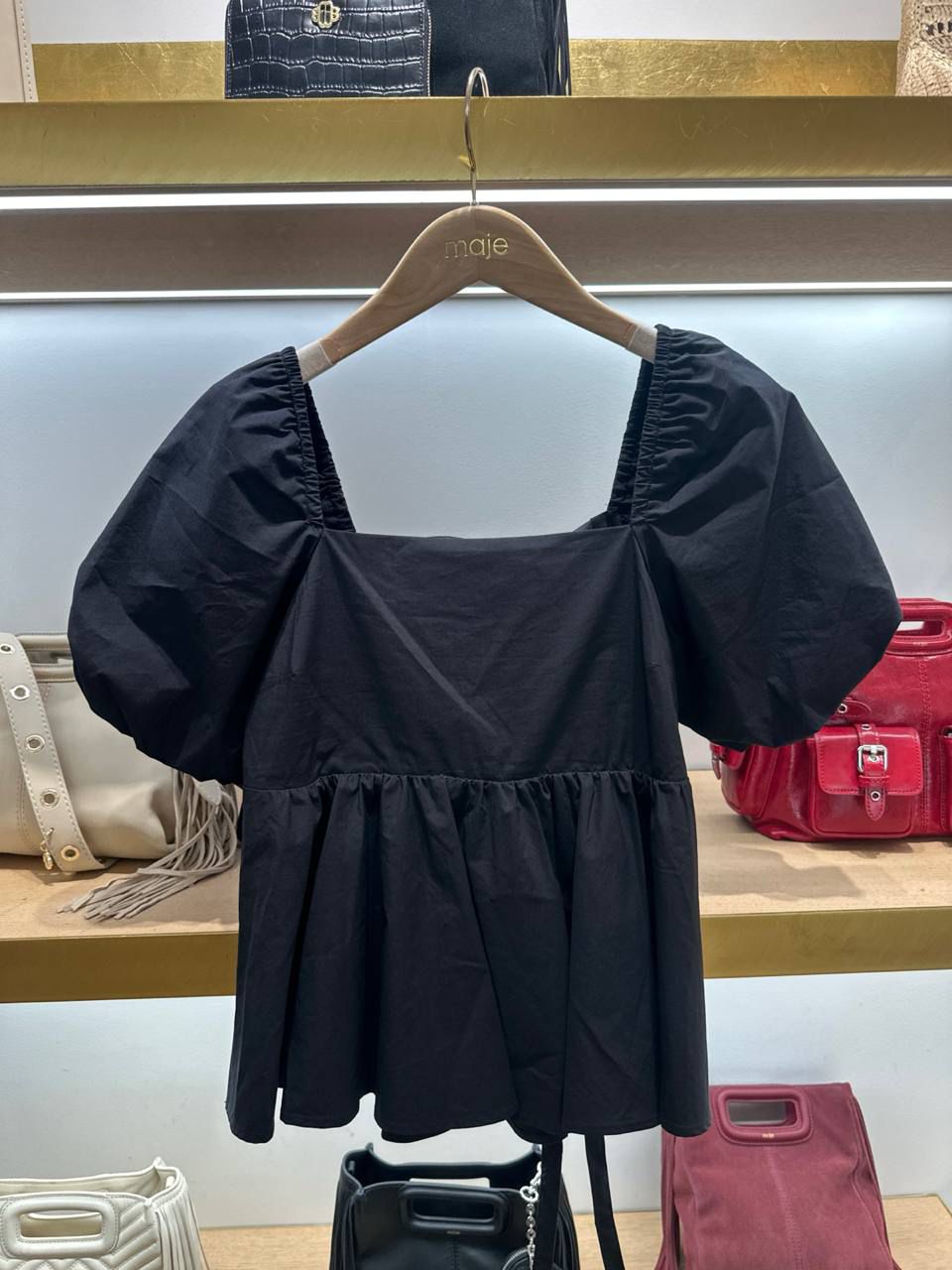 Puff-sleeve peplum top
