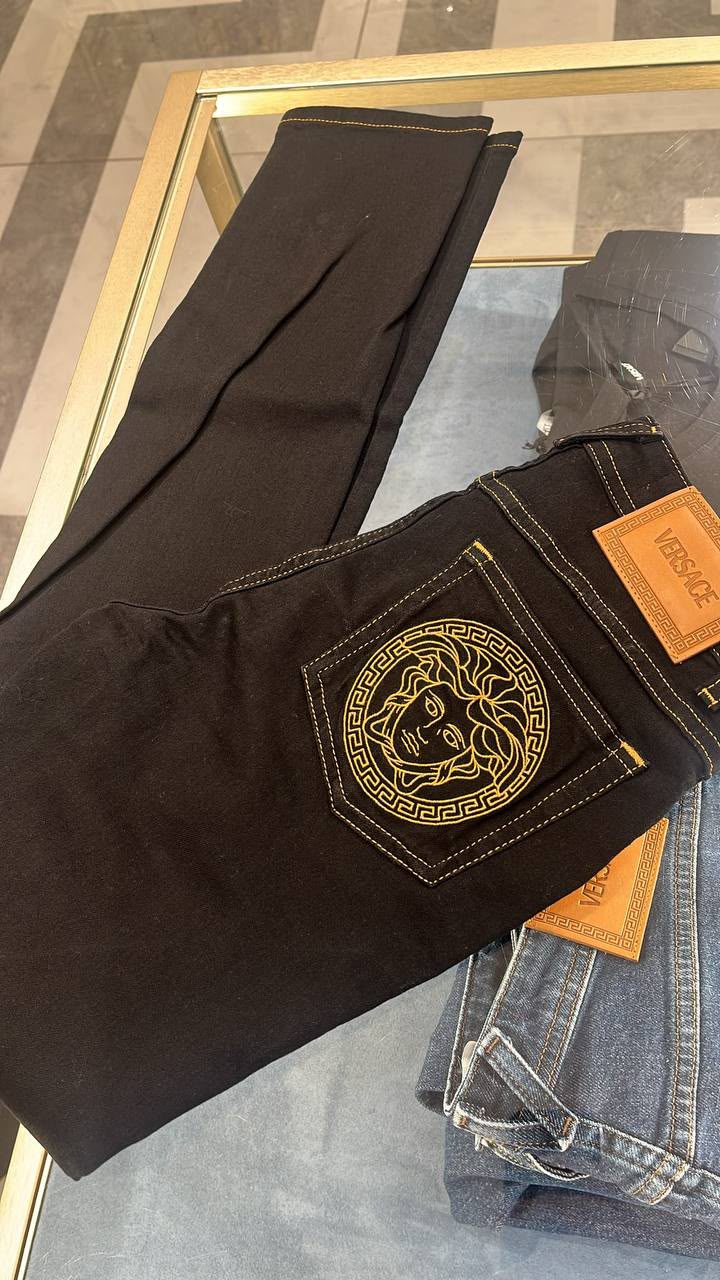 Medusa Head Embroidered Jeans