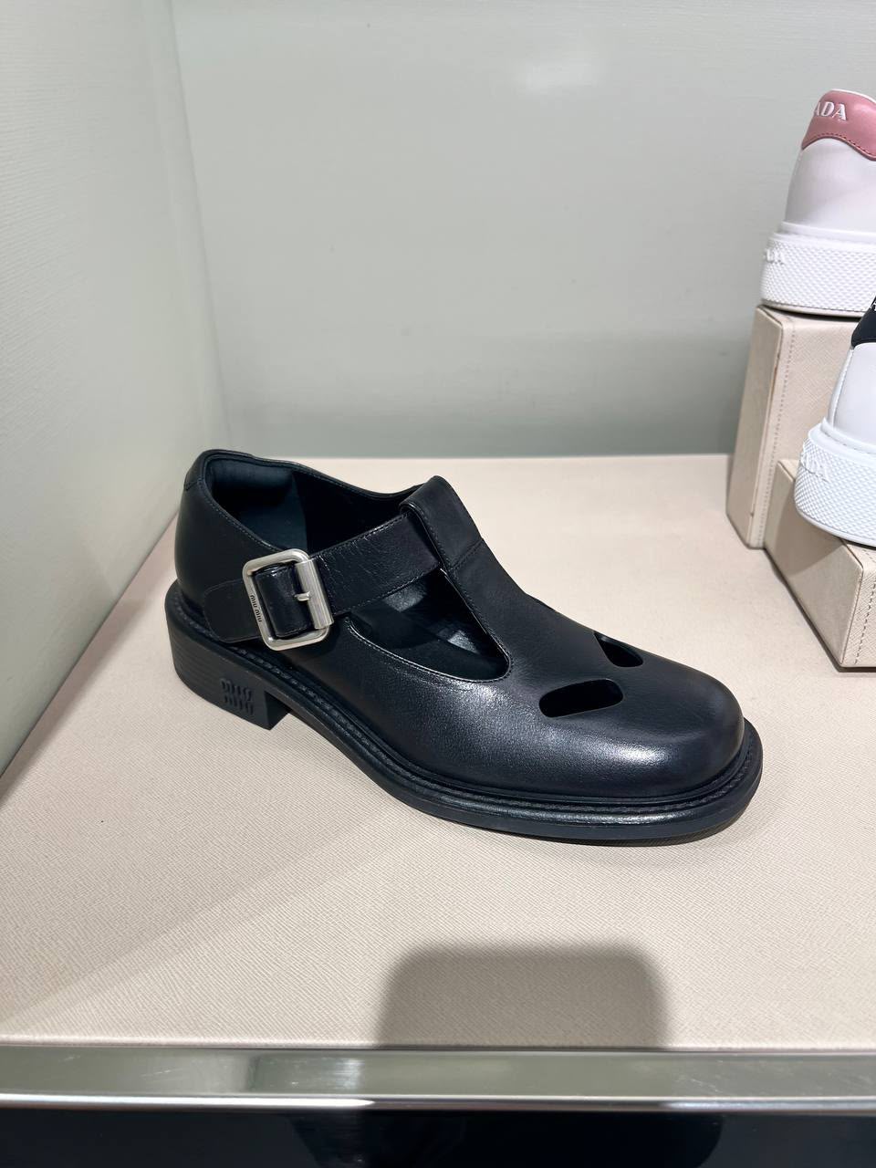 Leather T-strap shoes