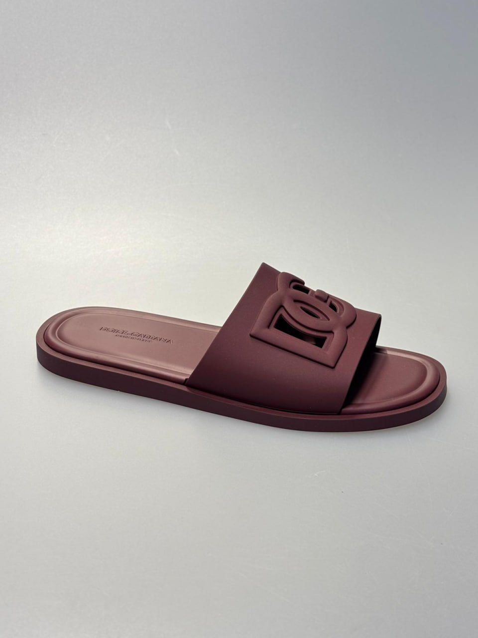 Rubber slides with DG logo