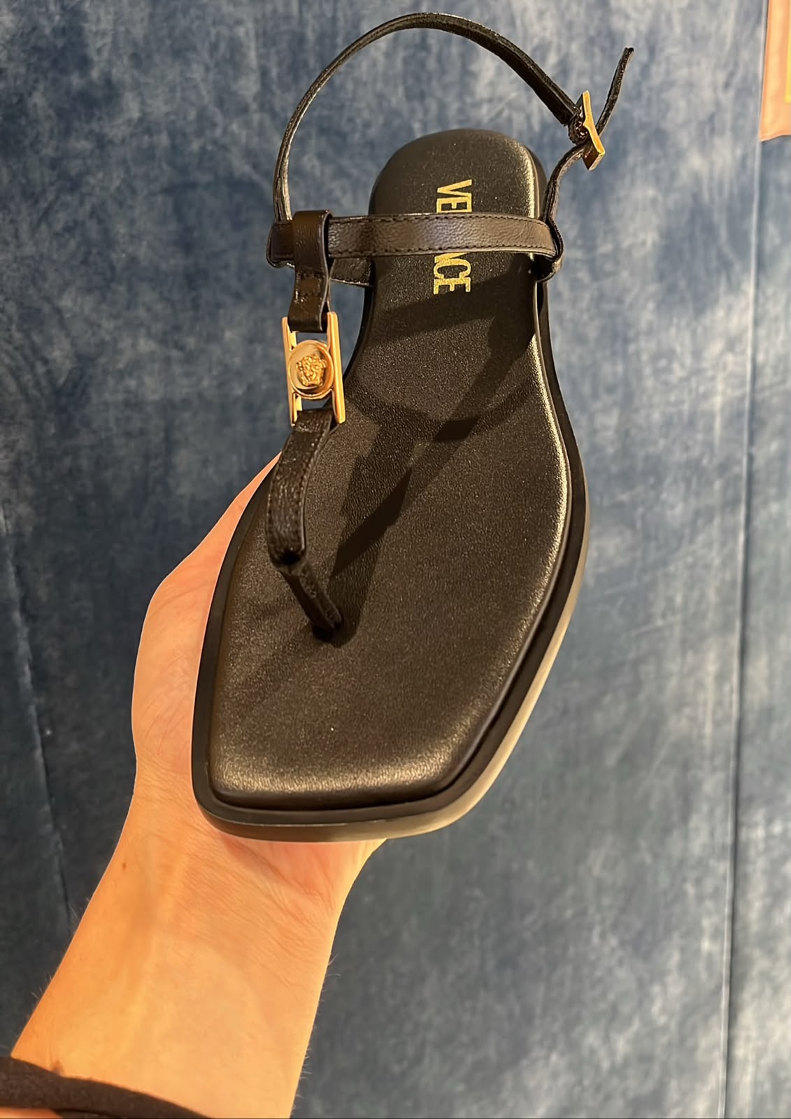 Medusa hardware thong sandals