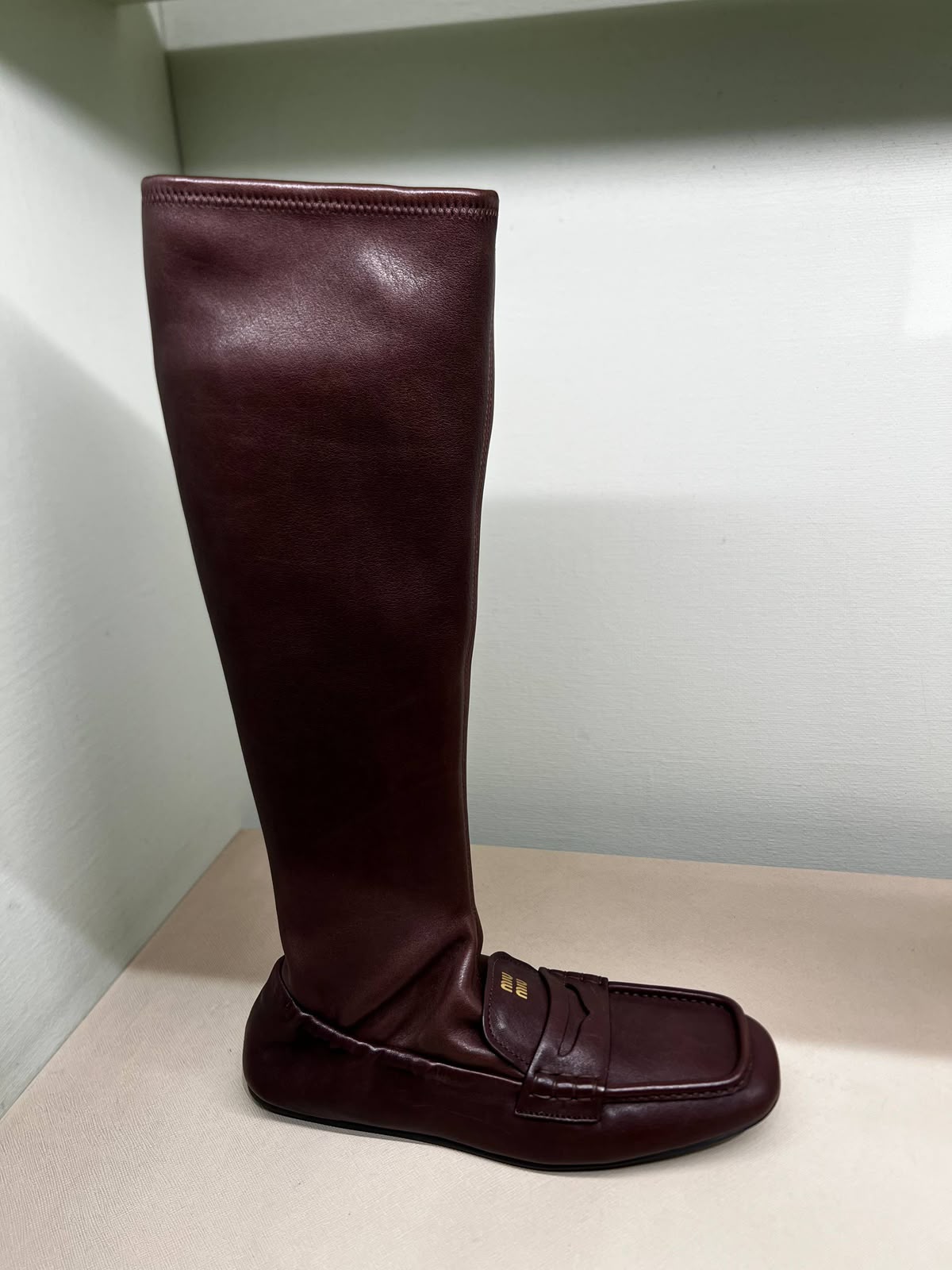 Leather knee-high loafers