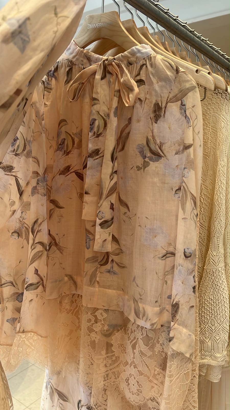 Floral Print Tie-Neck Blouse with Lace Hem