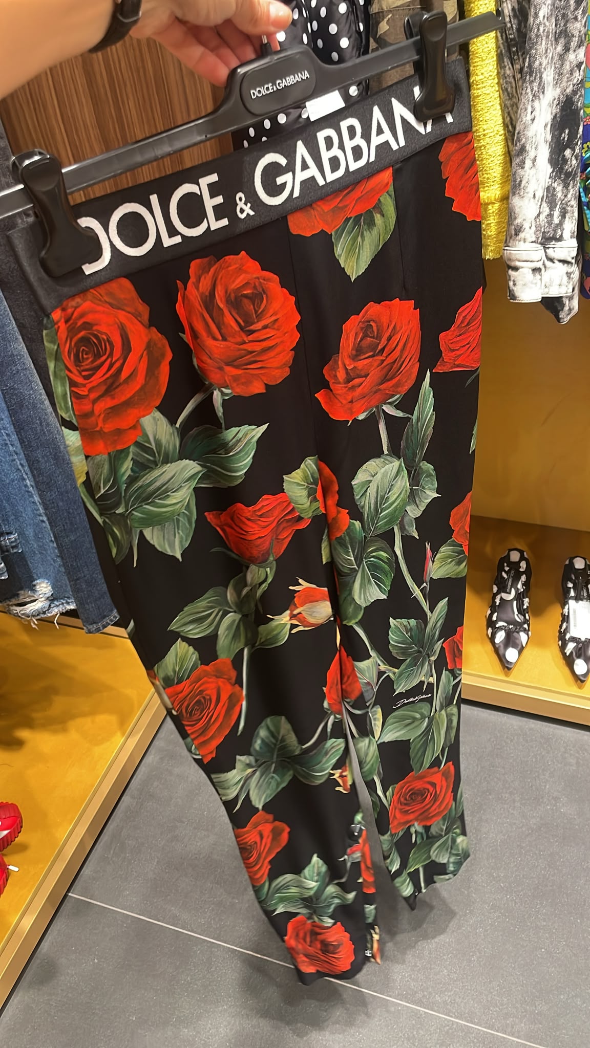 Rose-print trousers with logo waistband