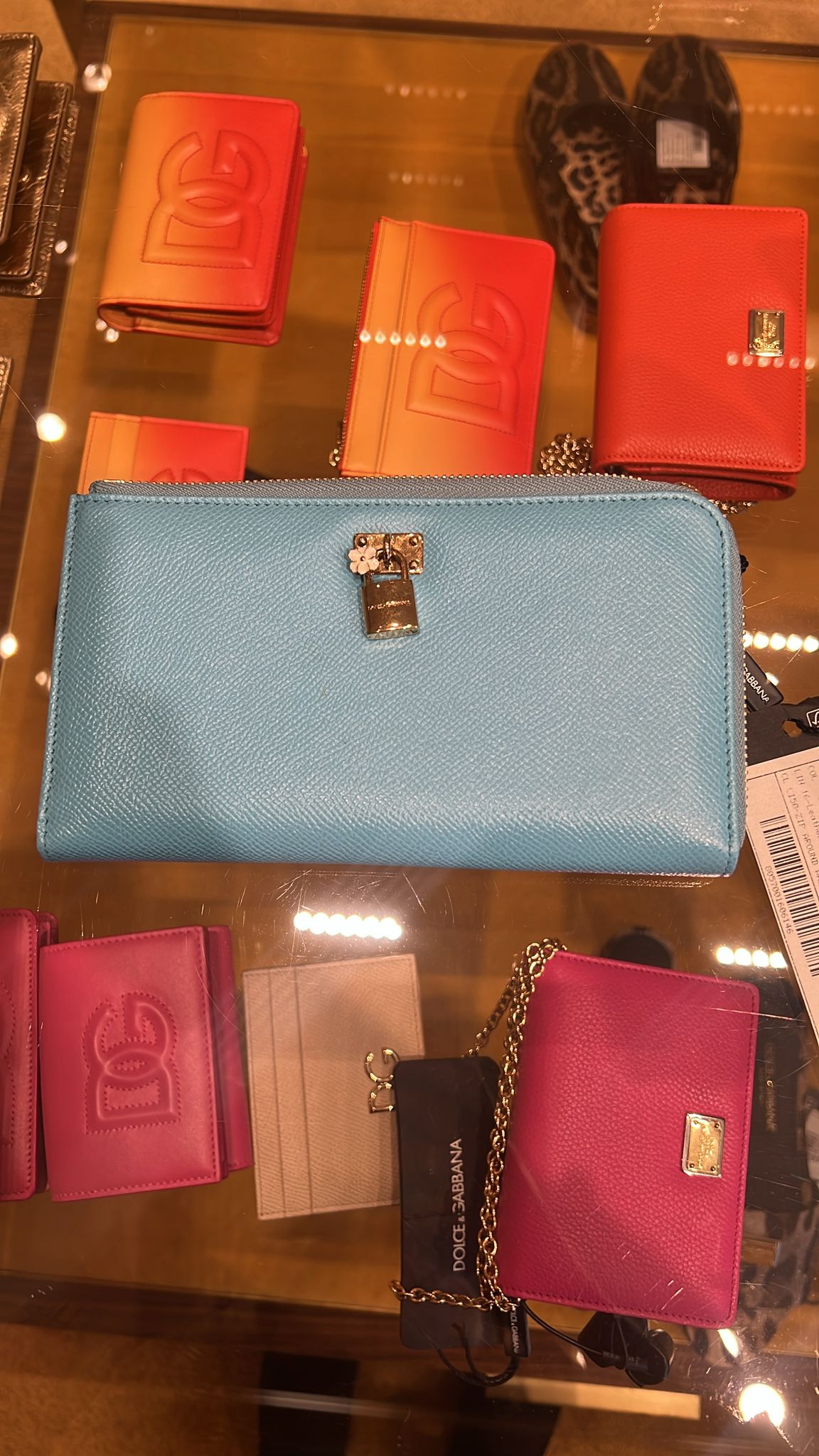 Zip-around wallet with padlock