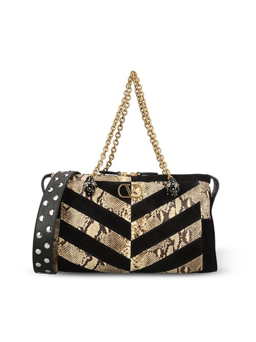 Borsa realizzata in pitone e suede
