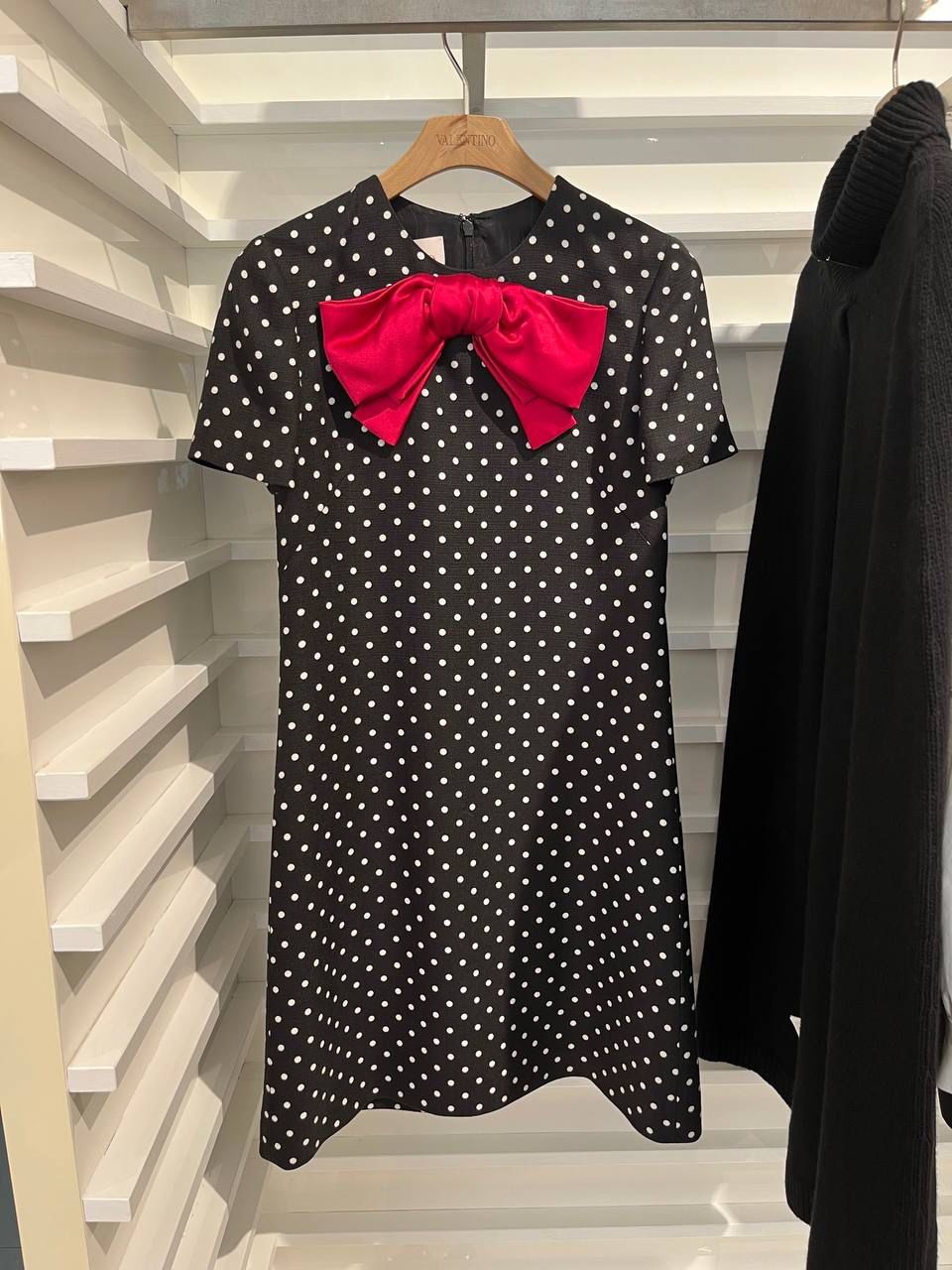 Polka-dot crepe couture dress with bow