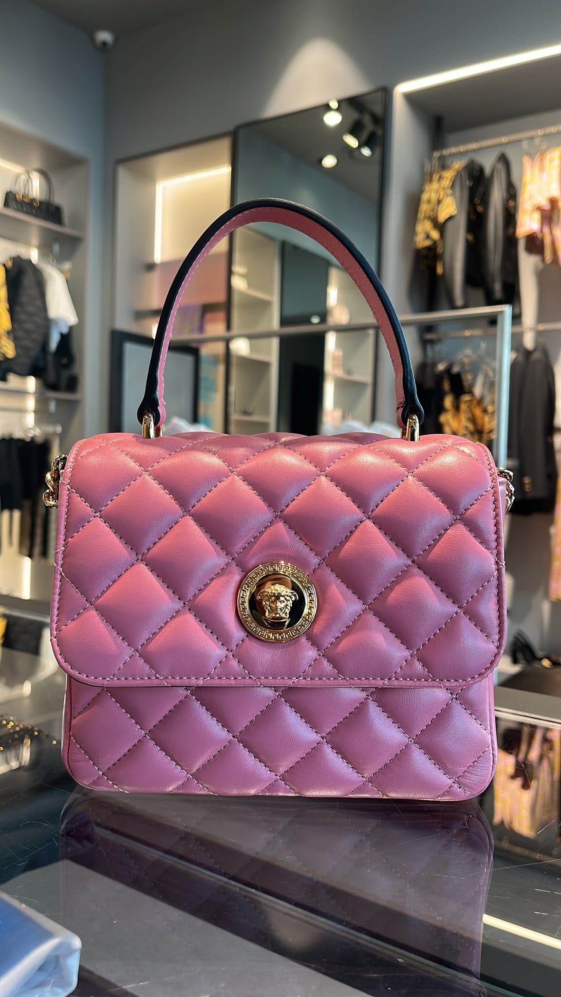 Quilted Leather Medusa Top Handle Bag